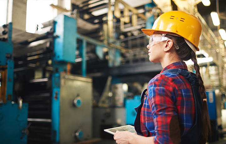 Female foreman on industrial floor
