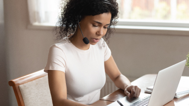 Woman talking on headset